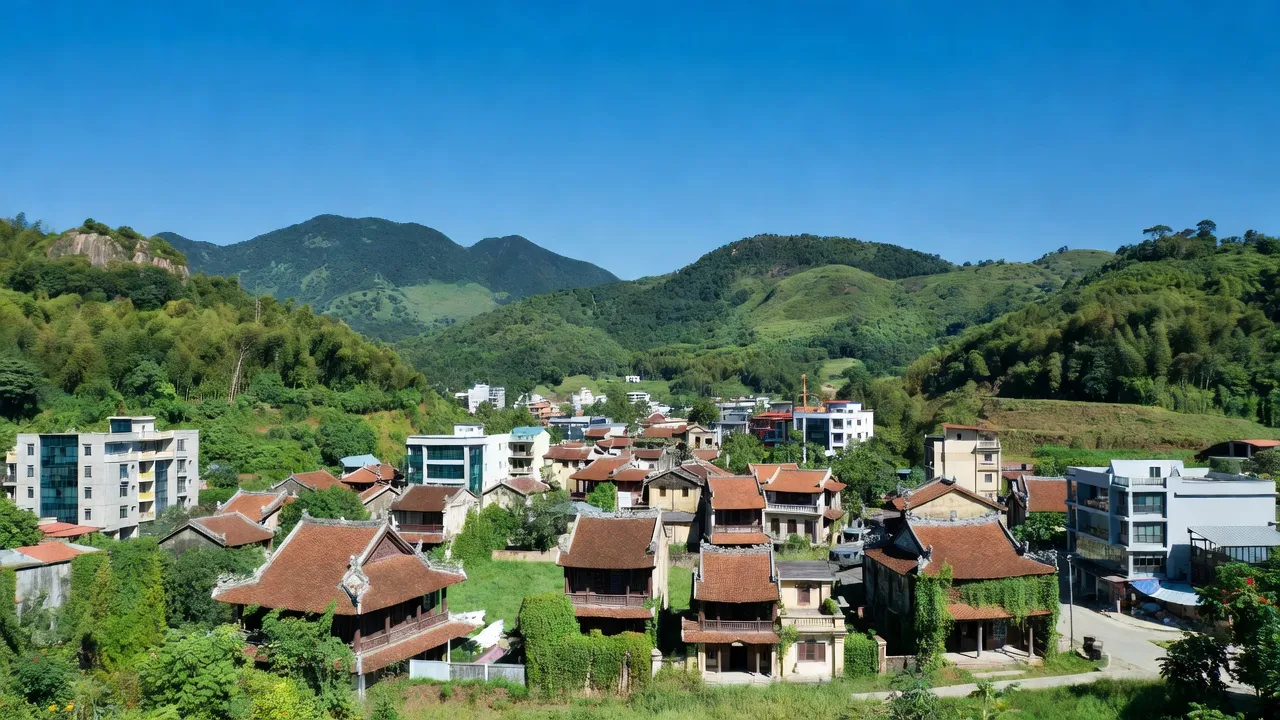 Cảnh quan thị trấn Cô Tô huyện Tri Tôn tỉnh An Giang với núi xanh và kiến trúc Việt Nam.