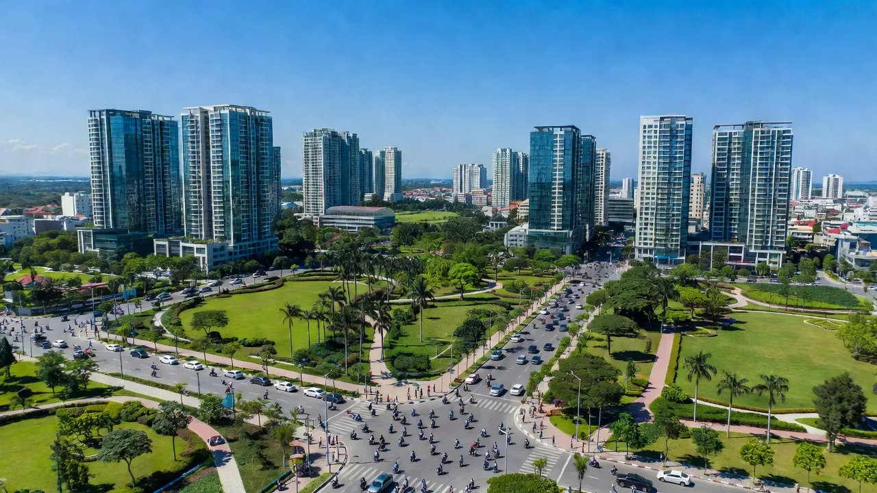 Phường Hưng Định, Thành phố Thuận An, kinh tế phát triển với cảnh quan đô thị hiện đại và cây xanh.