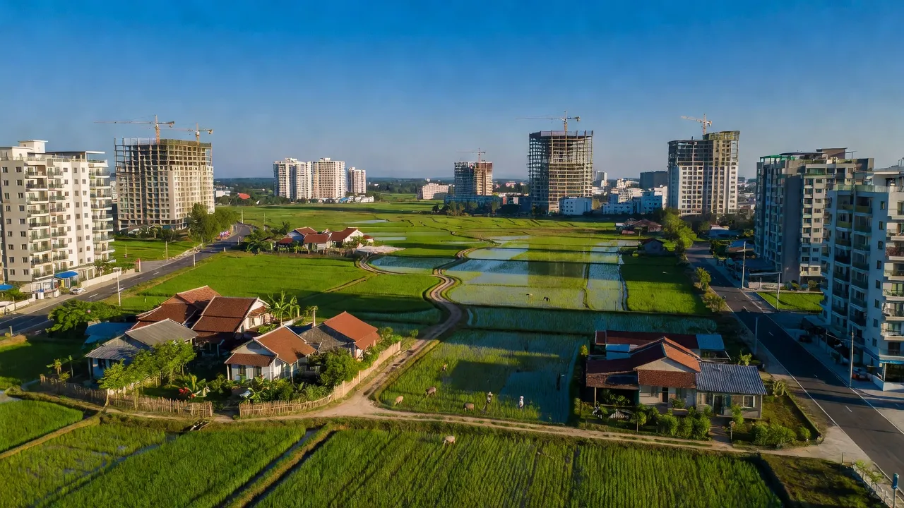 Cảnh quan Xã Đại Thịnh, Huyện Mê Linh, Hà Nội với đồng xanh và kiến trúc hiện đại.