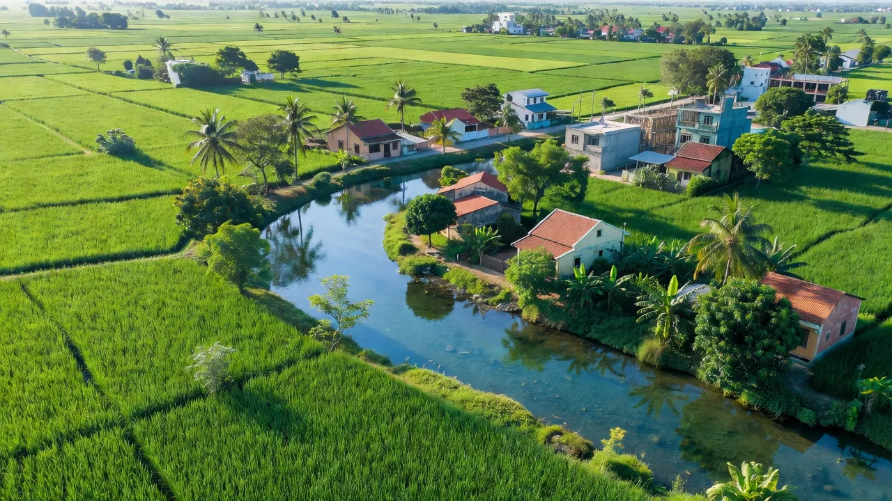 Phường Hiệp Lợi, Thành phố Ngã Bảy, Hậu Giang với cánh đồng xanh và dòng sông trong trẻo.