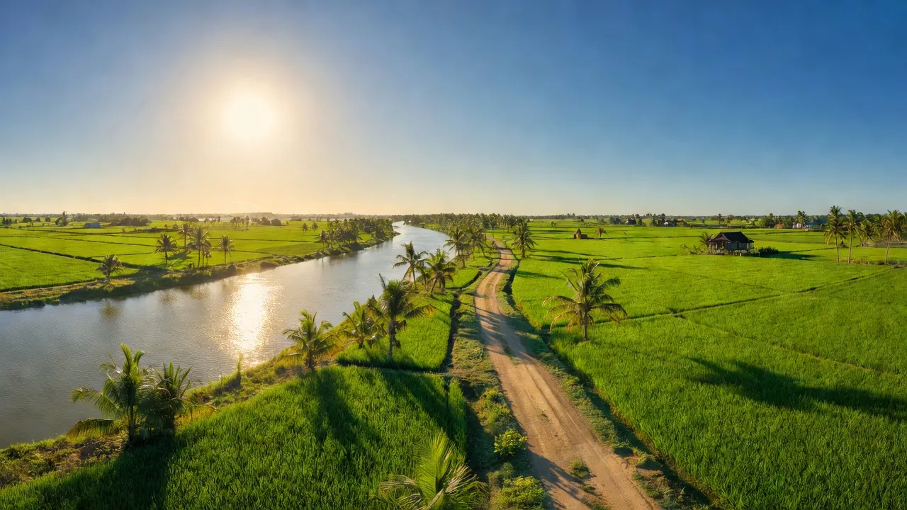 Cảnh quan Lộc Giang, huyện Đức Hòa, tỉnh Long An với sông Vàm Cỏ Đông và đồng xanh.