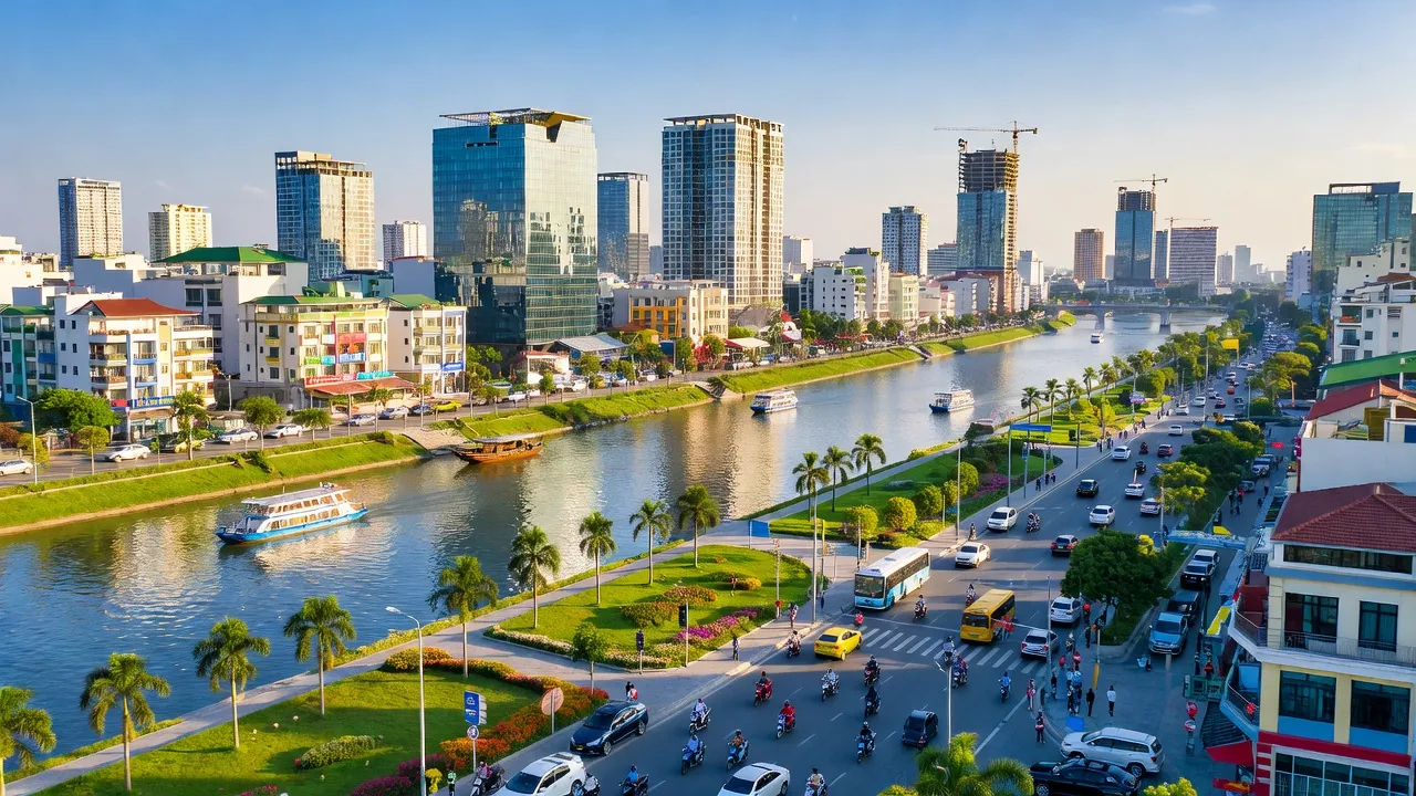 Phường 5, Tân An City, Long An showing urban development by Vàm Cỏ Tây River with modern buildings.