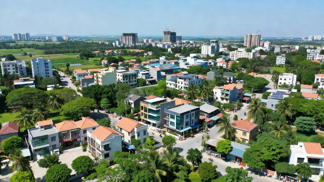 Phường Quỳnh Xuân, Thị xã Hoàng Mai, Nghệ An, with urban development and natural scenery.